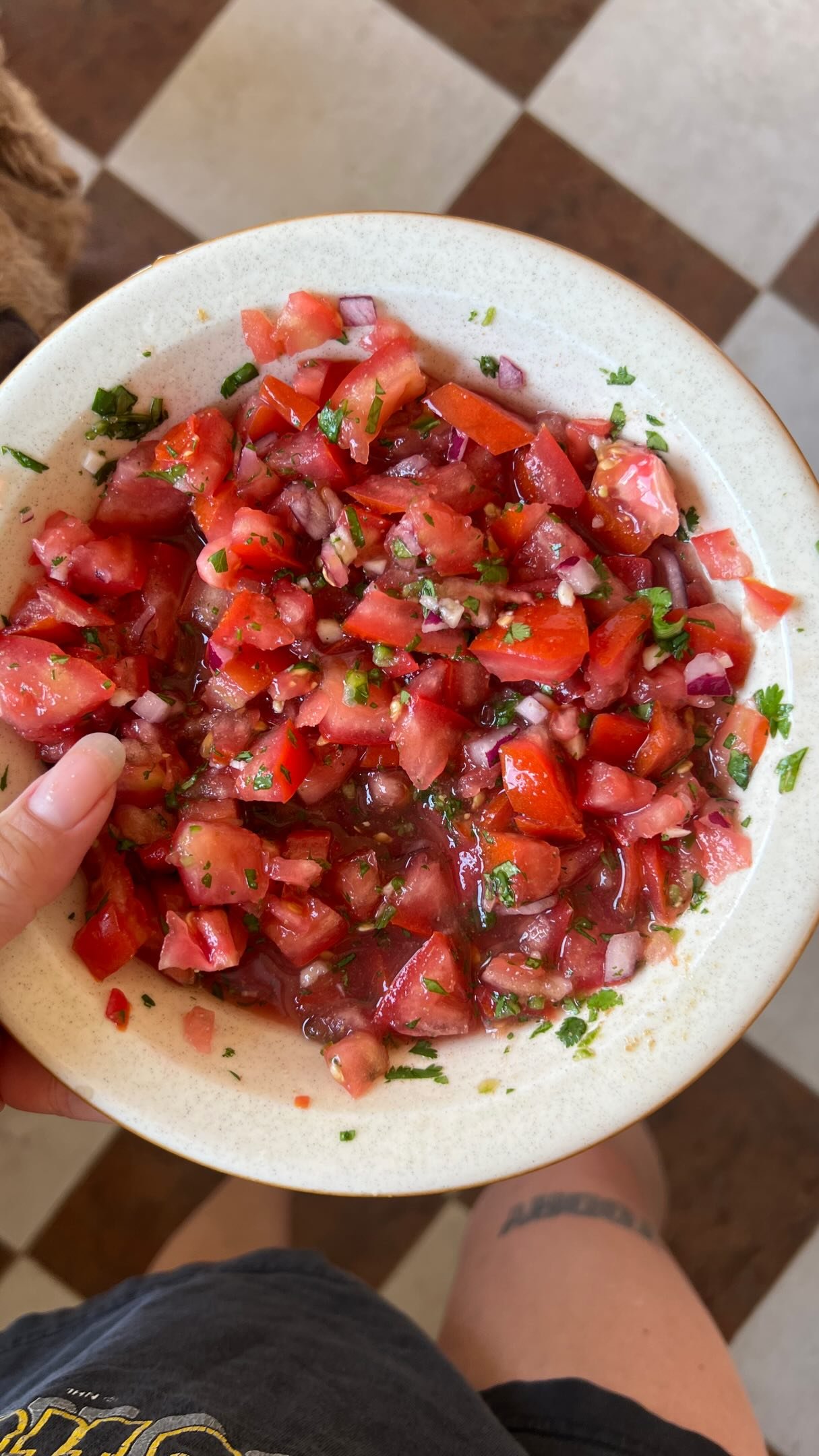 i tried making homemade salsa for the first time and it turned out so good i made it two days in a cuz we ate it ALL!🍅 i actually didn’t realize how easy it is and how much better it is than store bought?! like win-win 🤝

i also love a chunky salsa (and a chunky guac), so i didn’t use a food processor although i saw some recipes use it online. i prefer it this way. i measured it out the second time to include a quick lil recipe below, save it for the weekend just make sure you have some chips!! we used it for tacos one night and nachos the next. also really good to eat with a quesadilla! 

homemade salsa 
3 tomatoes, finely chopped 
1/8 cup finely chopped onion (i used red but white is good too)
just under 1 tbsp finely chopped jalapeño (add more for more spice, i wanted my kids to eat it lol)
just under 1 tbsp finely chopped fresh coriander 
1 clove garlic finely chopped or minced 
1 lime juice 
1/2 tsp cumin
1/2 tsp salt
tiny drizzle honey

homemade salsa • no refined sugar • healthy eating • easy recipe