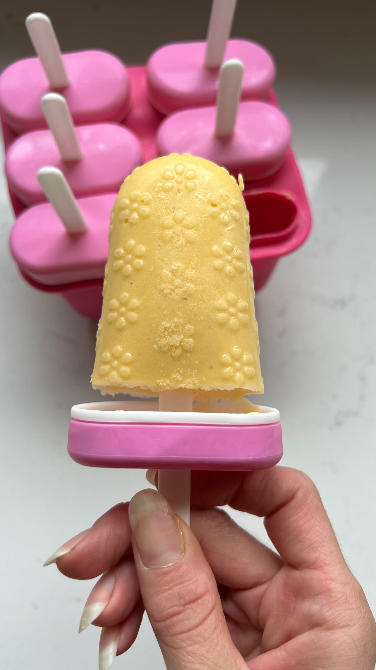 orange mango popsicles 🥭🍊 recipe below!!

this is a weekly occurrence at my house now and i’m not mad at it. it’s honestly such an easy thing to start making at home and then my kids are sooo excited about eating a popsicle and i am so happy to give them one knowing exactly what’s in it - only put a tbsp of honey in these ones and you could omit it entirely because the fruit is naturally sweet enough !! save this post to try the recipe below 💌✨👇🥭🍊

ingredients:
1 orange, peeled, fresh
1 cup yogurt
2 cups frozen mango
1 tsp vanilla
1 tbsp honey - optional

how to:
throw everything in the blender, i start w the orange and yogurt, and blend well. if you have some mango chunks that’s ok - my daughter loves finding a surprise mango chunk in her popsicles!
pour into your fave molds, freeze and enjoy guilt freeeee✌️

toddler approved • toddler snacks • healthy snacks • homemade popsicles • healthy toddler treats