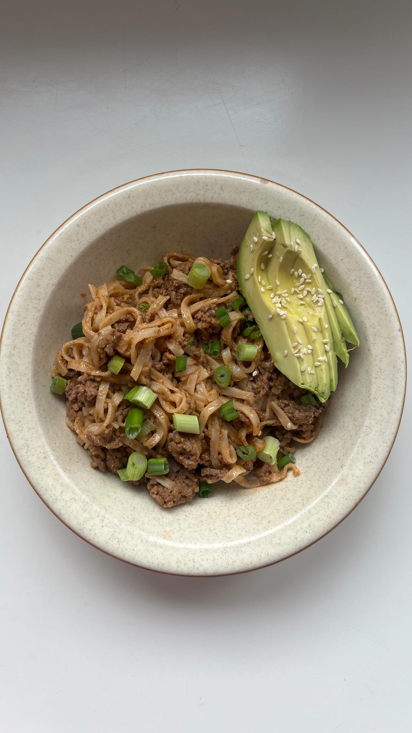 with my baby in the background ofc 🫶 this is my creamy coconut peanut beef and rice noodles, and it’s a family favourite, from aforementioned baby to toddler to adults!! highly recommend giving it a try cuz it’s also superrr easy and quick to throw together for a weeknight meal. comment “recipe” and ill send it your way or grab it at the link in @earth.to.rose and follow for more!! 🥜🍜
