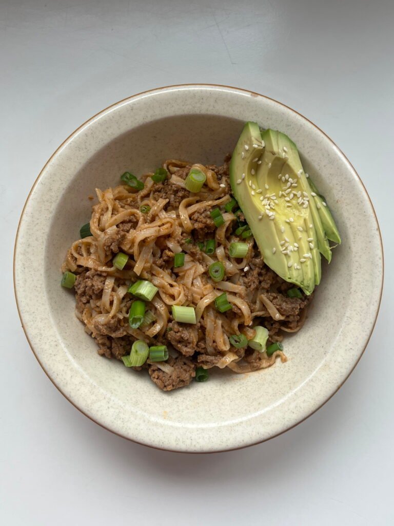 saucy coconut peanut beef and rice noodles