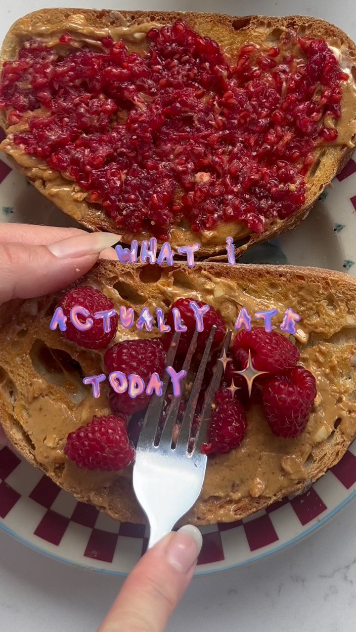 welcome to: what i actually ate today ✨

which is, quite literally, a series where i show you what i actually ate *today.* as in the today that is today, the day the video is shared. i make food often, for my whole family in fact, daily. i cook, i bake. what i share video-wise daily is usually at least a couple of days prior becuz that’s how life is. you gotta get shit done and then find the time to edit and drop your video, so it’s not necessarily possible to share everything in a timely manner. im going to make an effort to shoot the low-lift things i make to eat any given day, and share it that same day. this series should offer a glimpse at how my diet has evolved and what it *genuinely* looks like today. 

if you’ve been here since day 1, you know my roots in creating food content were SCD: i followed the specific carbohydrate diet closely, which is a grain free and refined sugar free diet, as i looked to maintain remission in my crohn’s disease. well, having two babies (under two) will sometimes have an effect on your diet 😅 and kudos to those who it doesnt loll. but while i still prioritize whole foods and make everything from scratch, i also eat good ol’ fashioned flour and rice. the toast featured here is sourdough (not homemade although i would loveee to get into making my own if anyone knows a good place to start - im intimidated), and then i did all natural crunchy pb, a quick homemade “jam” which is really just mashed raspberries, and a drizzle of honey on top. can’t go wrong!! 
follow along for more 👋

what i ate today • sourdough toast • pb toast • healthy eating